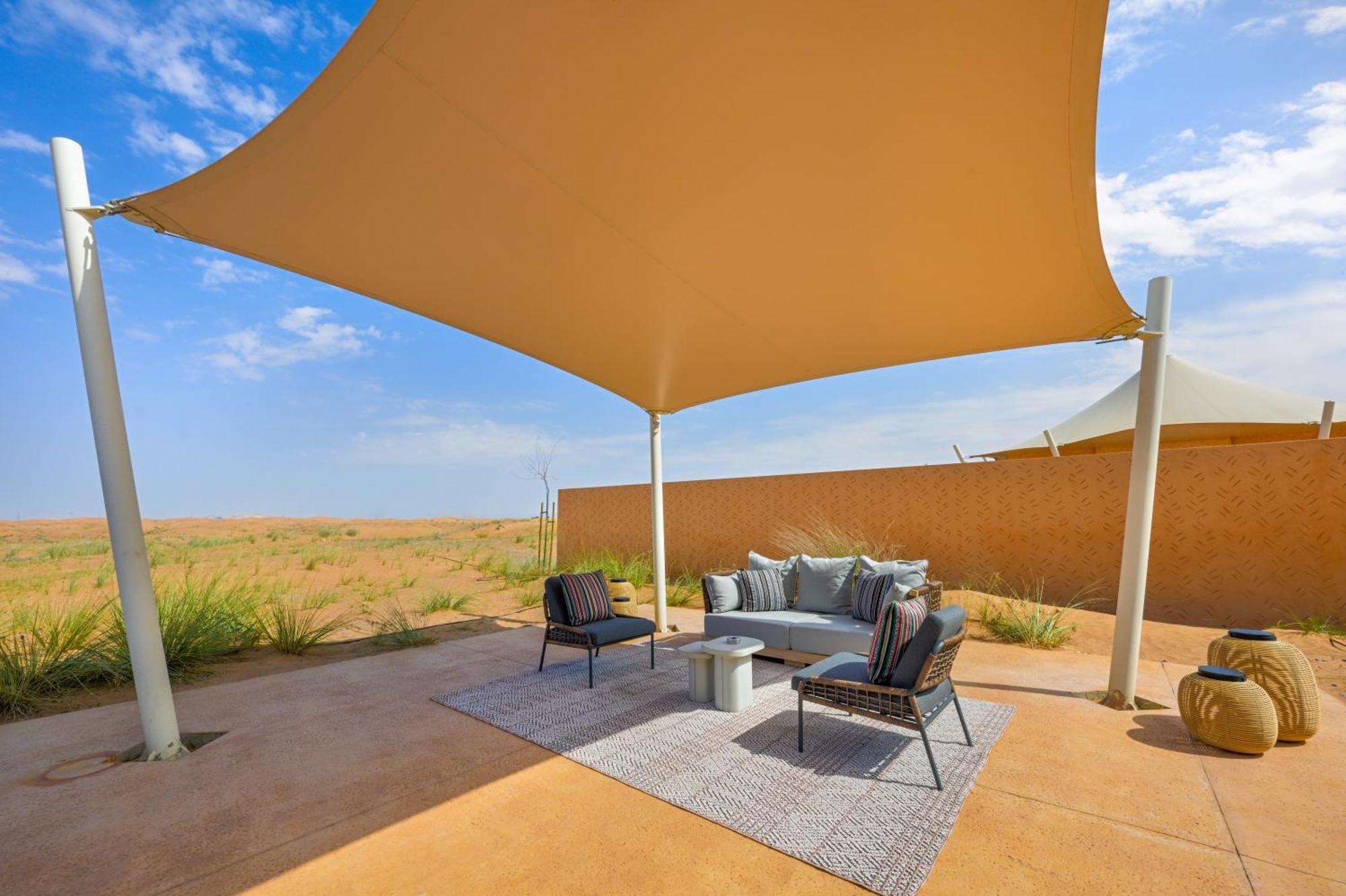 Hotel Al Badayer Retreat By Sharjah Collection à Margham Extérieur photo A shade sail at the Al Maha Desert Resort, Dubai