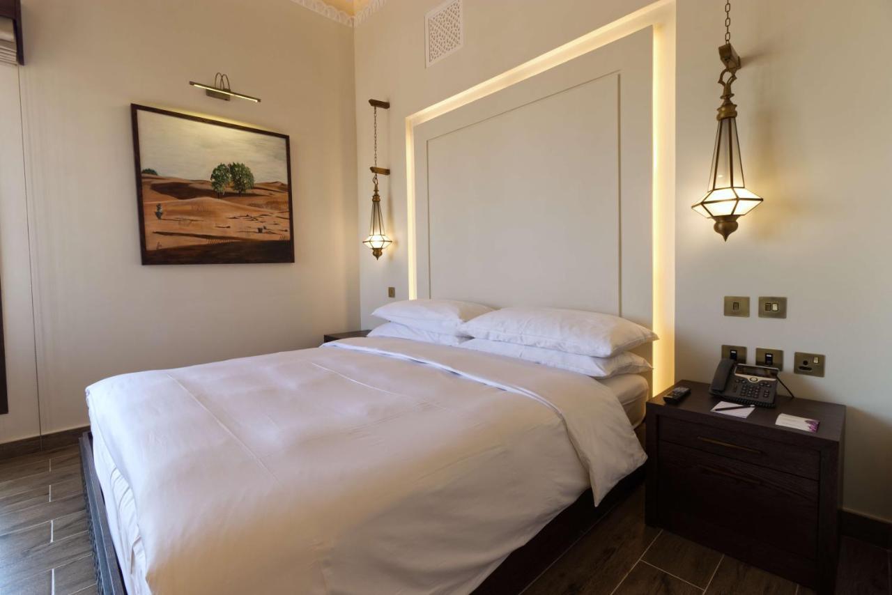 Hotel Al Badayer Retreat By Sharjah Collection à Margham Extérieur photo A bedroom at the hotel